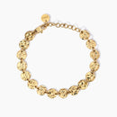 Bracciale dorato con tondi effetto martellato