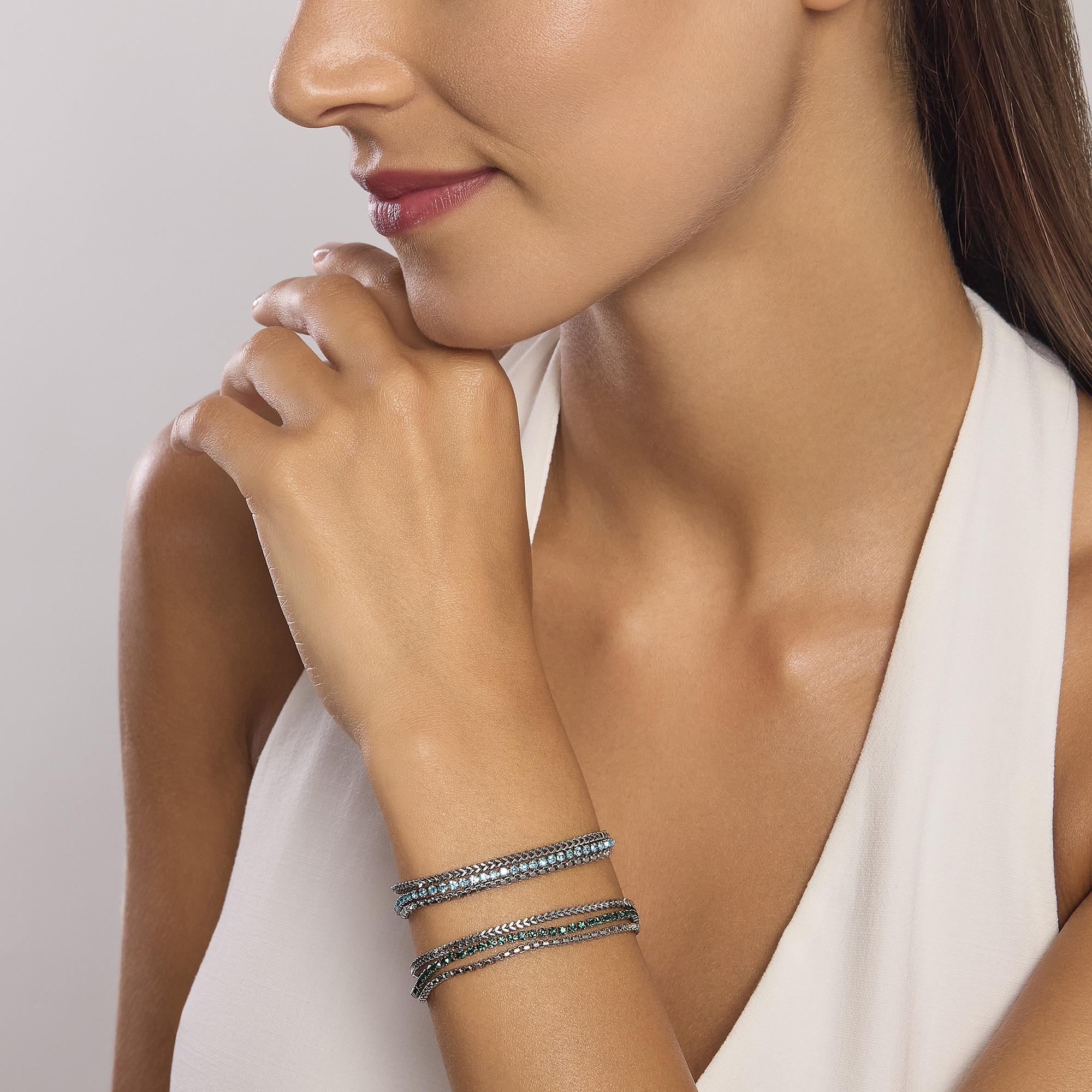 Bracciale dorato con due catene e tennis verde