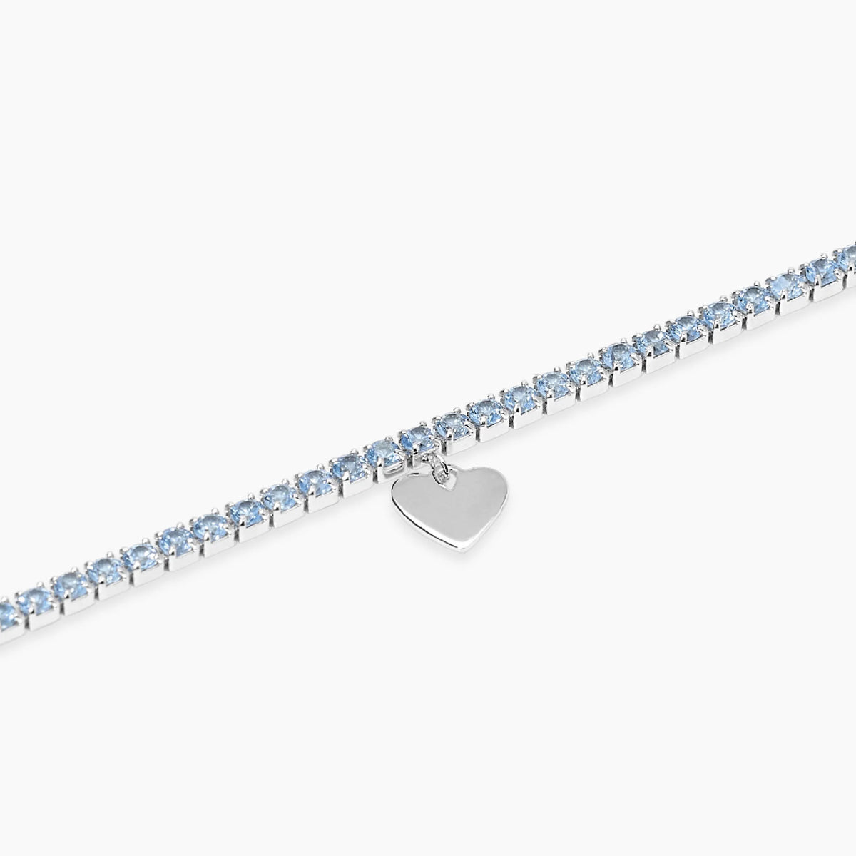 Bracciale tennis con acquamarina sintetica e ciondolo cuore